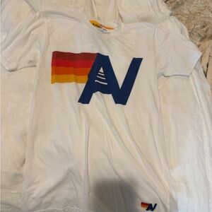 Aviator Nation White Tee with Navy AV Logo and Red-Orange-Yellow Stripe